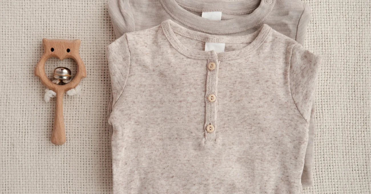 How to Choose the Right Fabric for Custom Baby Shirts